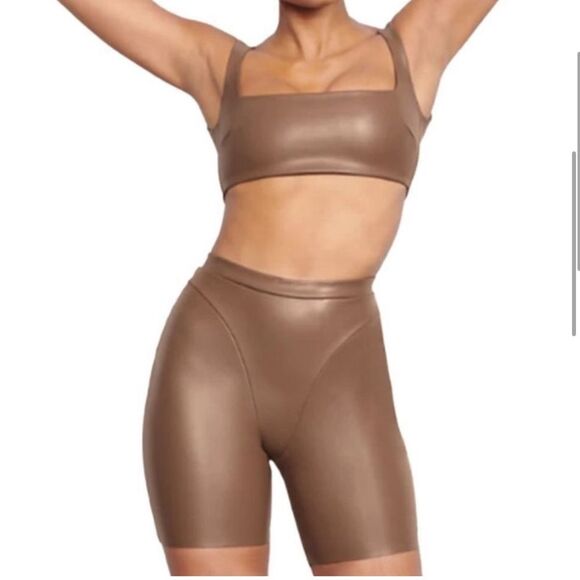 SKIMS Pants - Skims faux leather biker short cocoa color size S NWT